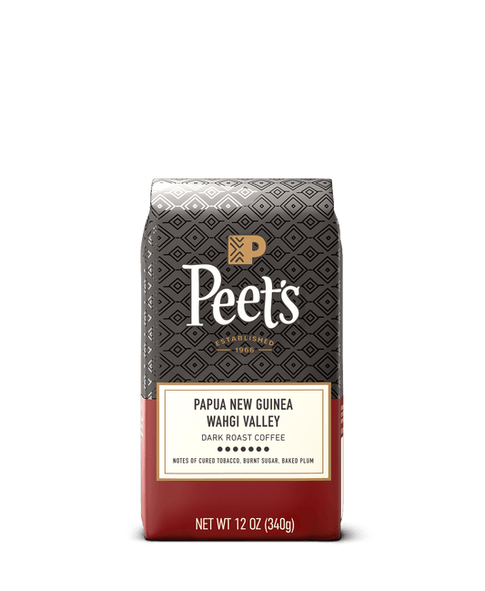 Peet's coffee bag with detailed branding and product information on a black background