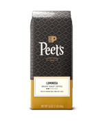 Peet's coffee bag with black and yellow design on a green background