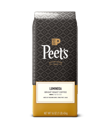 Peet's coffee bag with black and yellow design on a green background