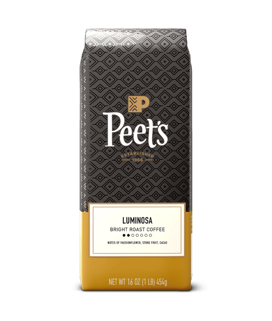 Peet's coffee bag with black and yellow design on a green background