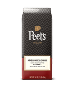Peet's Coffee Arabian Mocha Sanani dark roast coffee package on a green background