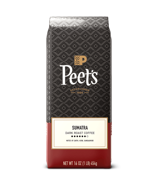 Peet's Sumatra dark roast coffee package on a green background